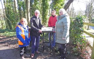 From left, Rosemary Thomason FoHS member, Mike Bishop president FoHS, Helen Thomason FoHS member and Cllr Susan Moore at the the new commemorative lectern